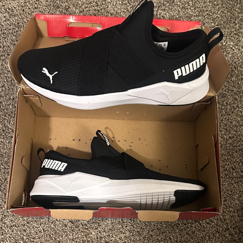 PUMA women’s Black and White Slip-On Sneakers